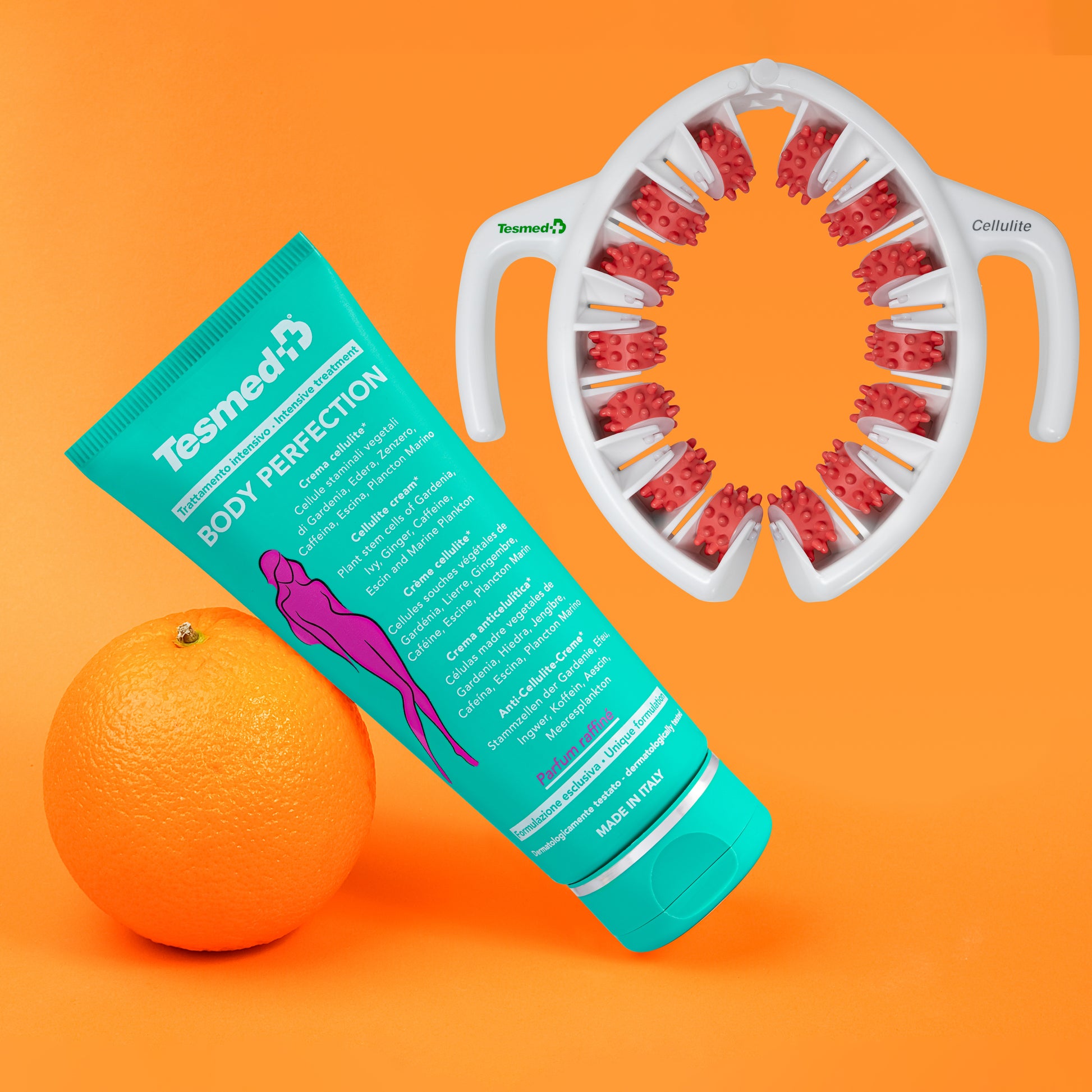 tesmed cellulite rosa + crema body perfection su sfondo arancione